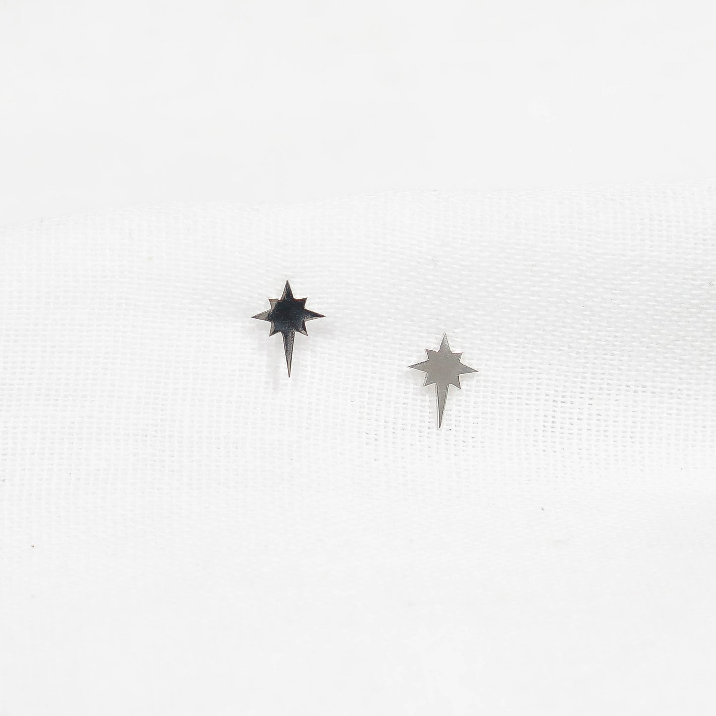 EIGHT-POINTED STAR STUDS 9 X 7 mm - ARGENTIUM SILVER EARRINGS