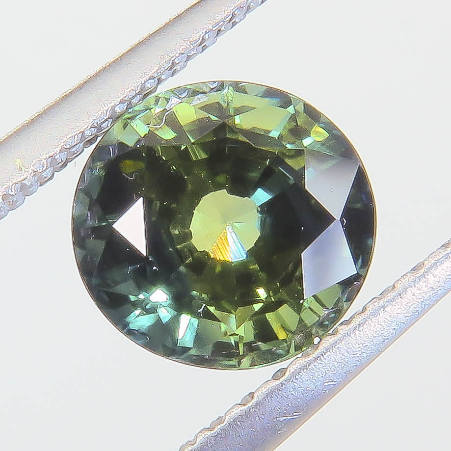 1.545 ct Natural Sapphire Round Peacock — Thailand