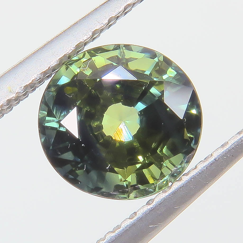 1.545 ct Natural Sapphire Round Peacock — Thailand
