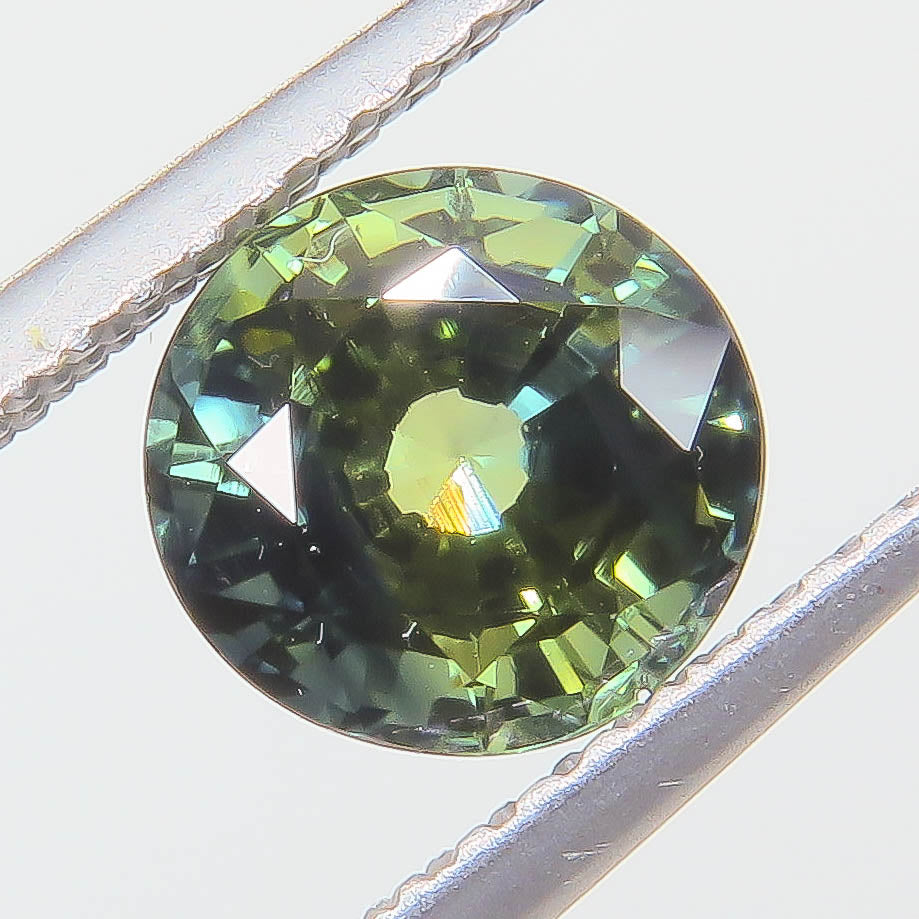 1.545 ct Natural Sapphire Round Peacock — Thailand