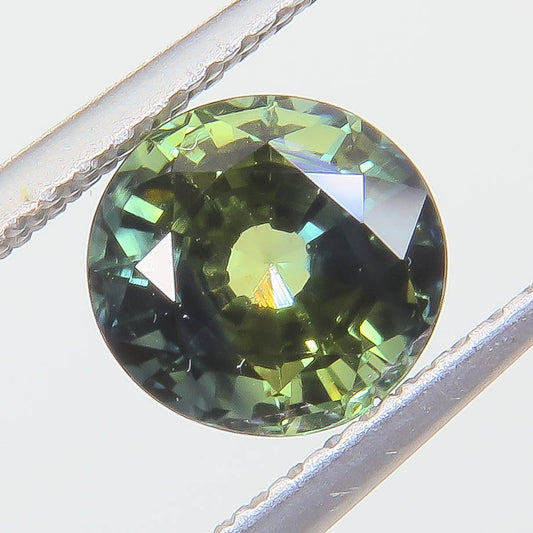 1.545 ct Natural Sapphire Round Peacock — Thailand