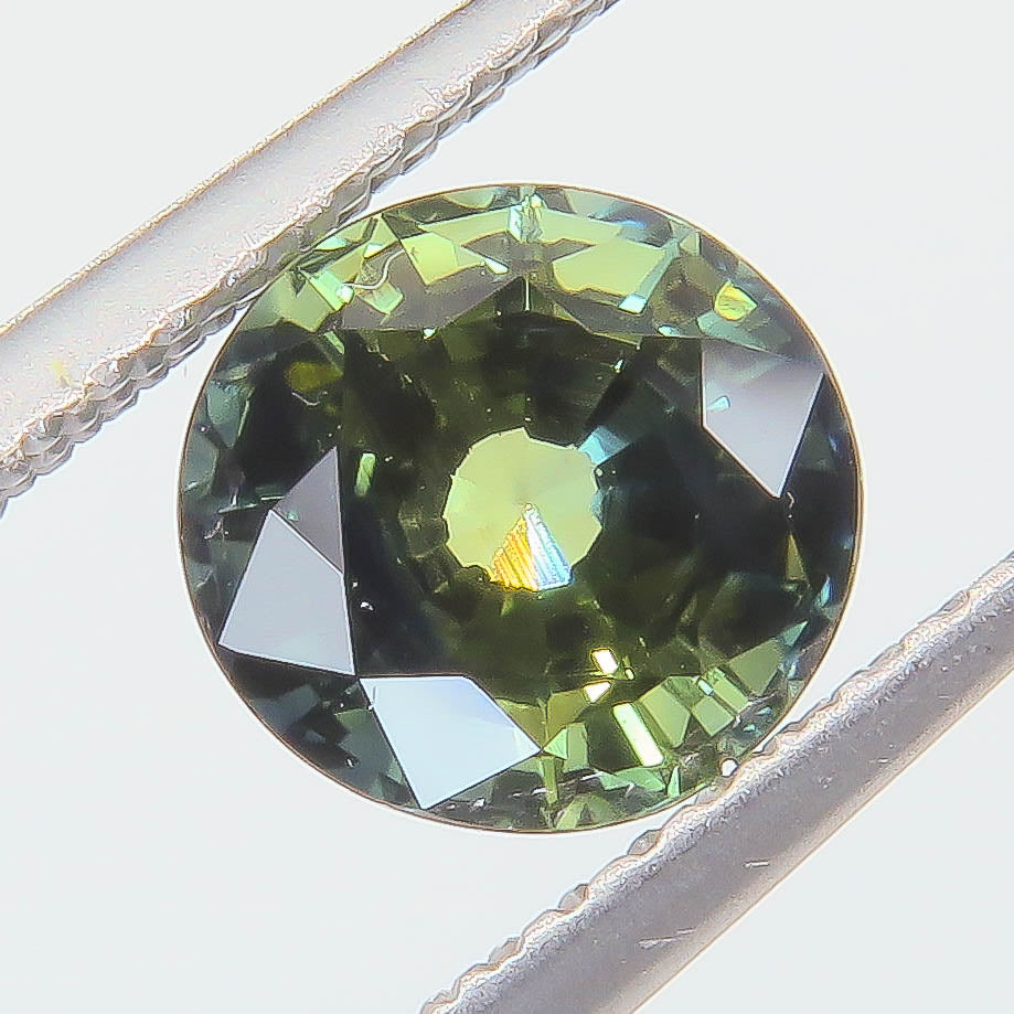 1.545 ct Natural Sapphire Round Peacock — Thailand